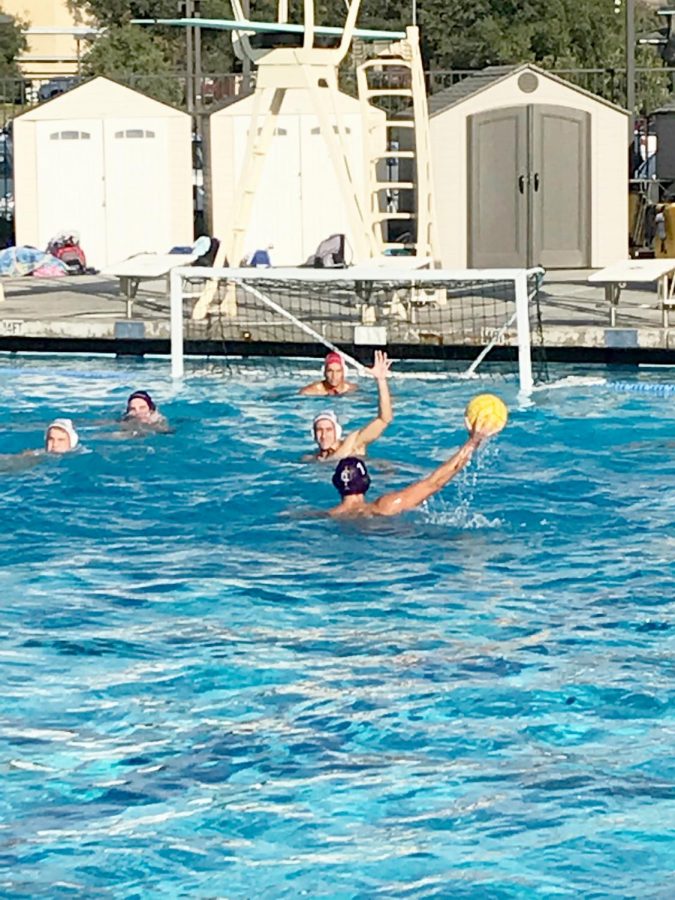 The Kingsmen water polo team takes a shot against the Redlands Bulldogs on Wednesday, Sept. 25.