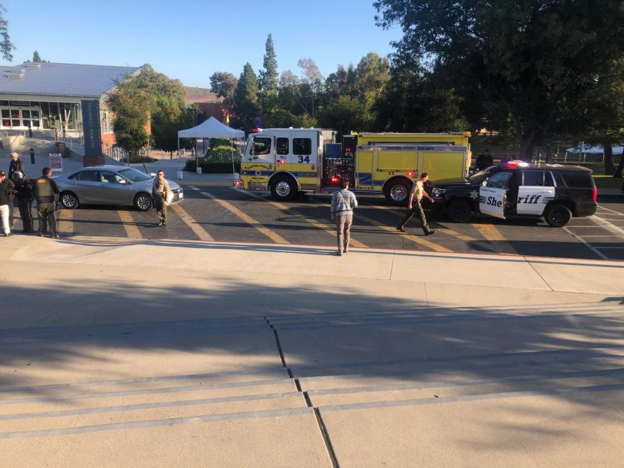 Emergency vehicles respond after a student was hit in the crosswalk between Ullman Commons and the Spine.