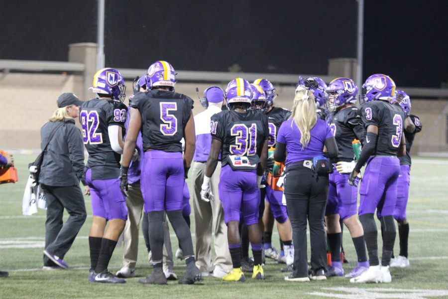 Defensive back Obasi Dees (31) huddles with the Kingsmen during the Smudge Pot Game on Saturday, Nov. 2.