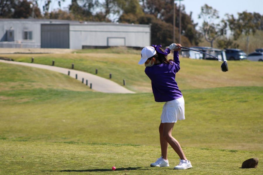 Sophomore Regals golfer, Anna Bello driving on the first whole at Olivas Links at their first tournament of the season. 