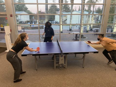 Members including president Dylan Herrera and Treasurer Christina Koch playing Round Robin at the clubs meeting.