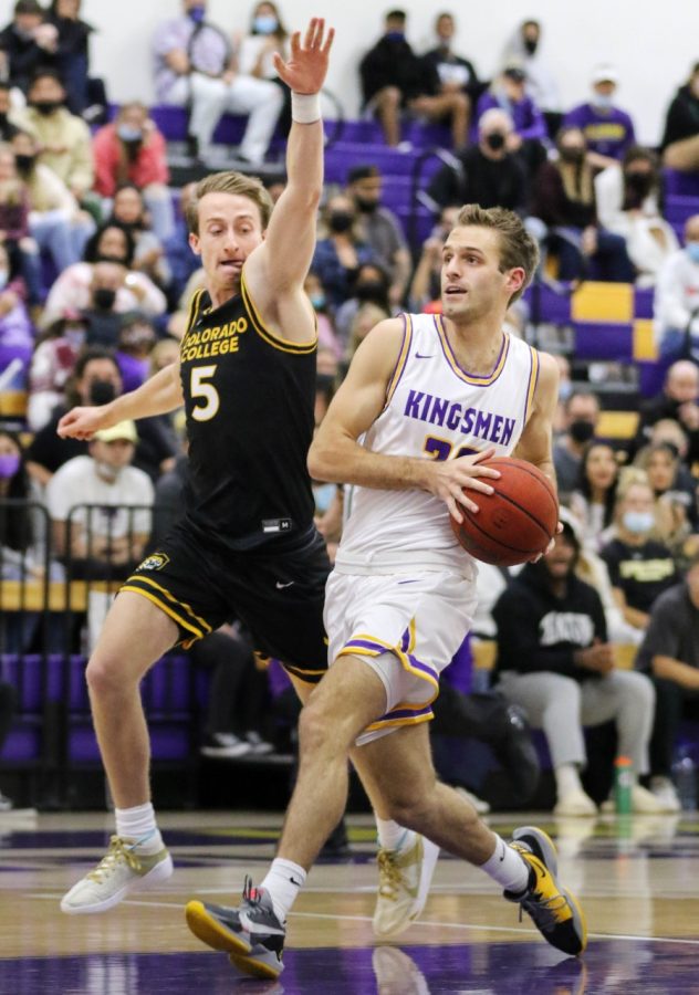Brooks Mallory drives to the basket looking to score and put the Kingsmen on the board.