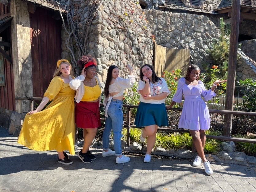 Five+Cal+Lutheran+students+pose+as+Encanto+characters+at+Disneyland.