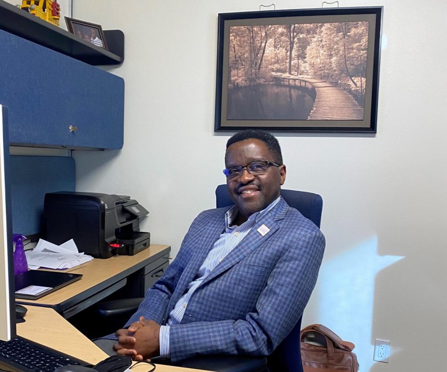 Taiwo+Ande+sitting+at+his+desk%2C+ready+to+take+on+his+new+role+as+senior+associate+provost.