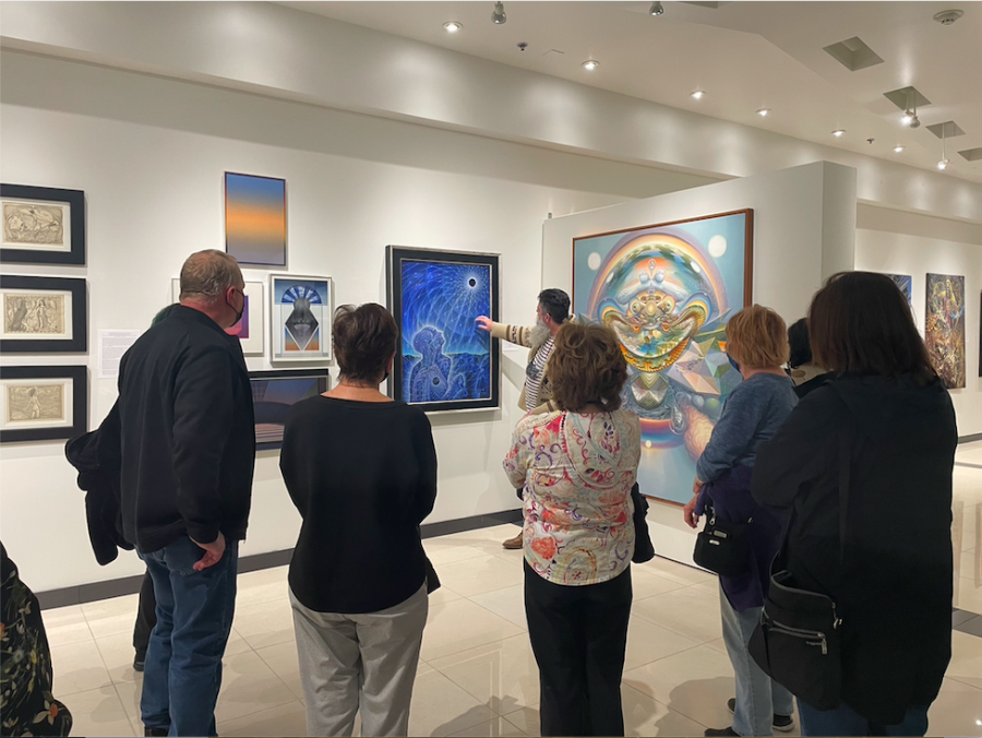 Michael Pearce explains the intricate meanings behind the psychedelic artwork held at The Otherworld exhibit at California Lutheran University.