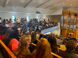 Attendees at The Honors Convocation Ceremony filled the Samuelson Chapel. Overflow seating was available in Ullman 101 but many chose to stand in the back.