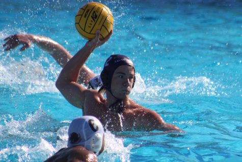 Kingsmen water polo player lines up a shot in the semifinal of the Division III Collegiate Water Polo Championship against MIT.