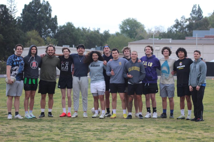 Members of the Knights Rugby Football Club pose for a group photo on Memorial Field.