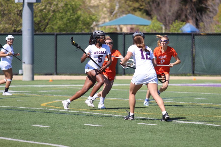The Regals lacrosse team tries to find a way through the Pomona-Pitzer Sagehens.