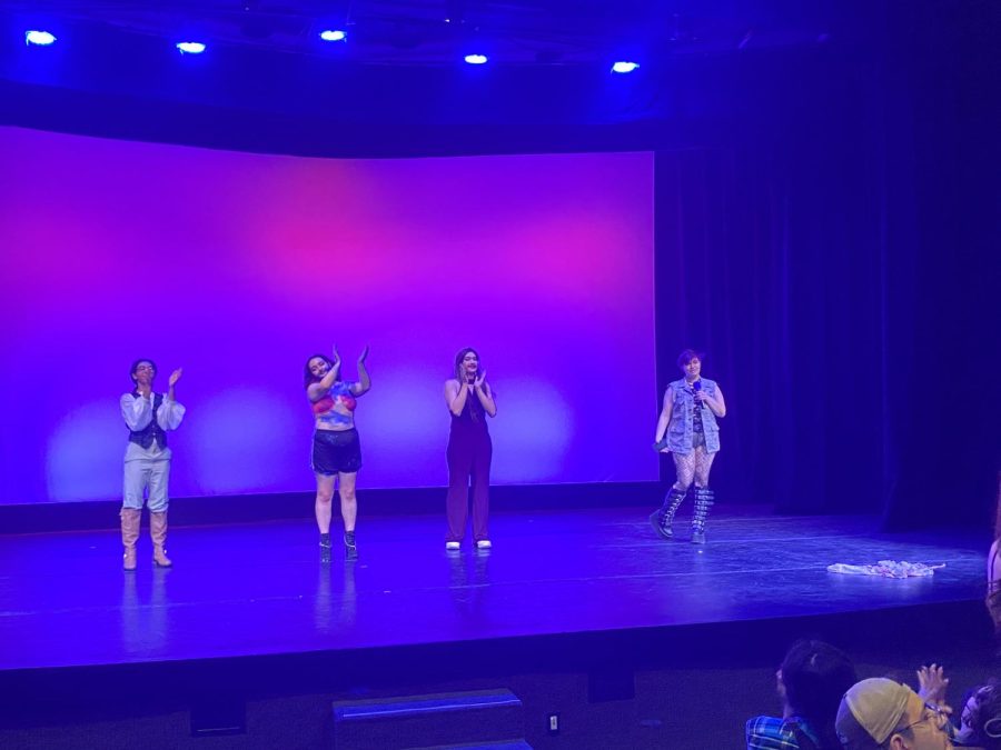 First-year Maija Talvitie (Prince Florizel), senior and CLU PRIDE Club co-president Dylan Gallagher (Chan Cla), senior Jerry Tovar (Homo La Flor) and sophomore emcee Ash Langtry closed the CLU PRIDE Club Drag Show by applauding the club’s tech team.