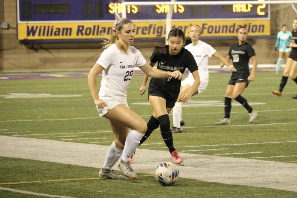 Sophomore Regals Defender Brynn McMahon (pictured) steers the ball away from La Verne’s offense. 