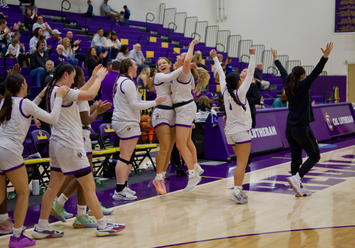 The Regals celebrate as they win first place in the SCIAC in the 2023-2024 regular season.