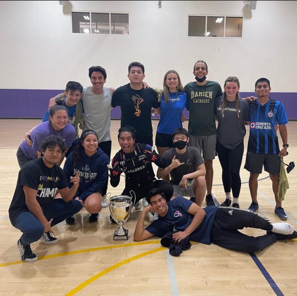 Intramural soccer team, Smurfs Pt. 4, poses for a photo after winning their tournament. 