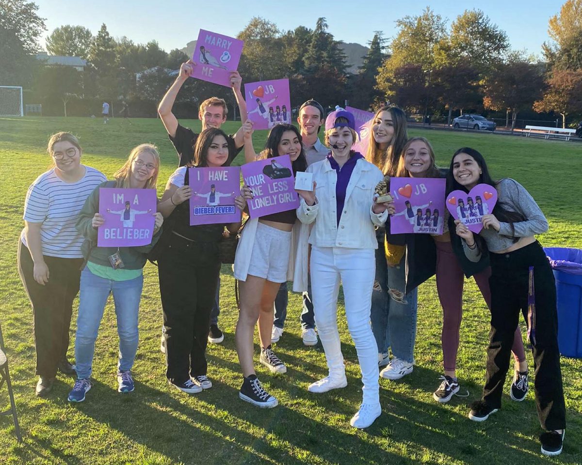 Transfer Eliana Sarrow, Senior Leah Derrick, Senior Fallin Fabrega, Senior Ryan Kramer, Senior Laura Armendariz, Transfer Riley Kozakar, Transder Marina Karapetian, Alumni Aryana Johnson, Senior Val Vidal, supporting Senior Amanda Janssen after her win in the 2021 Lip Sync Battle sponsored by iCLU Radio.