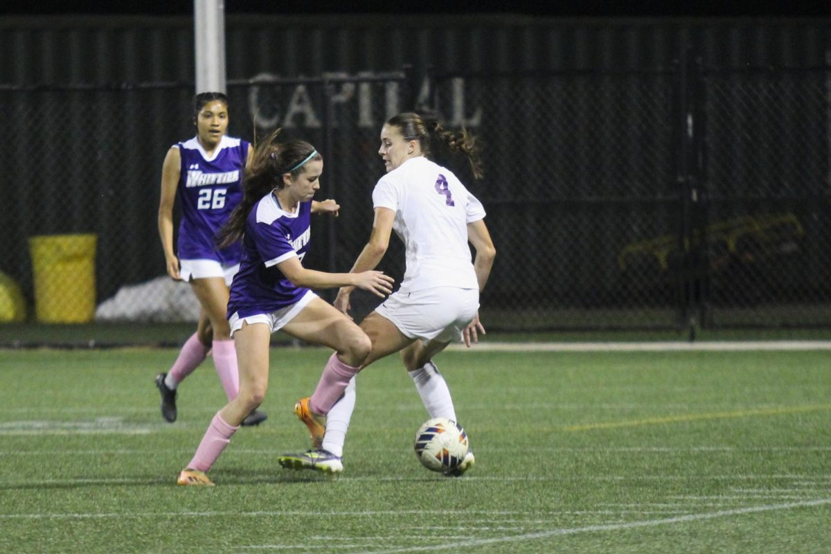 Senior defender Avery West wins a tackle. 