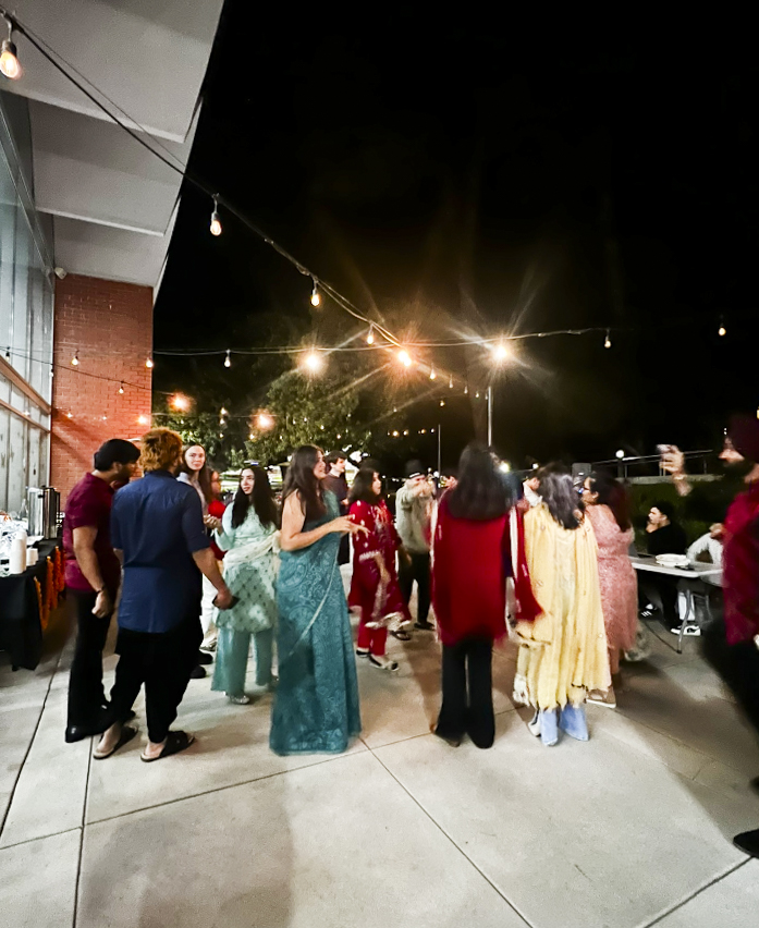 Everyone dancing and celebrating Diwali outside of the Student Union. 