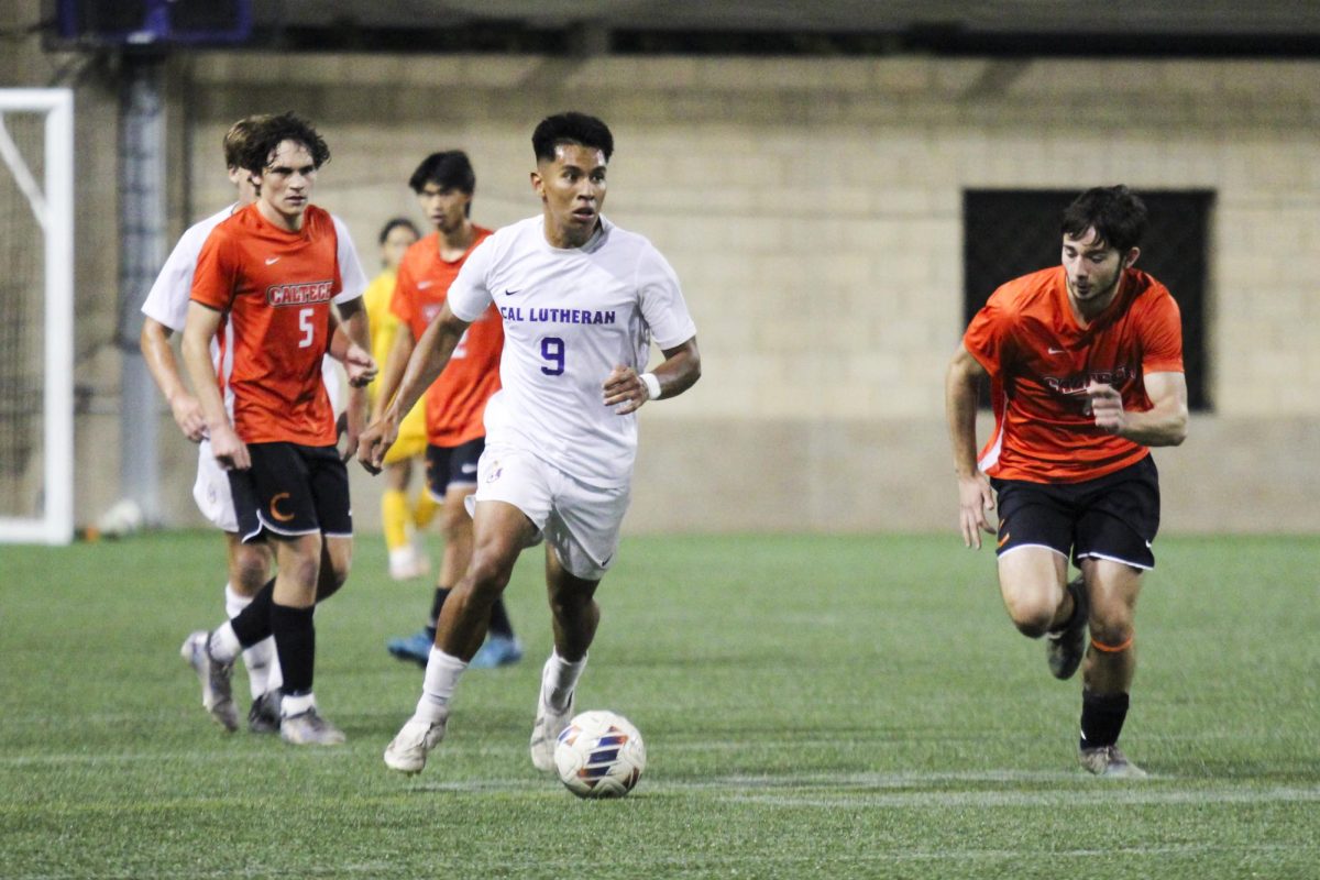 Midfielder JP Melgoza keeping the ball away from Caltech defender during Saturday’s action at William Rolland Stadium.