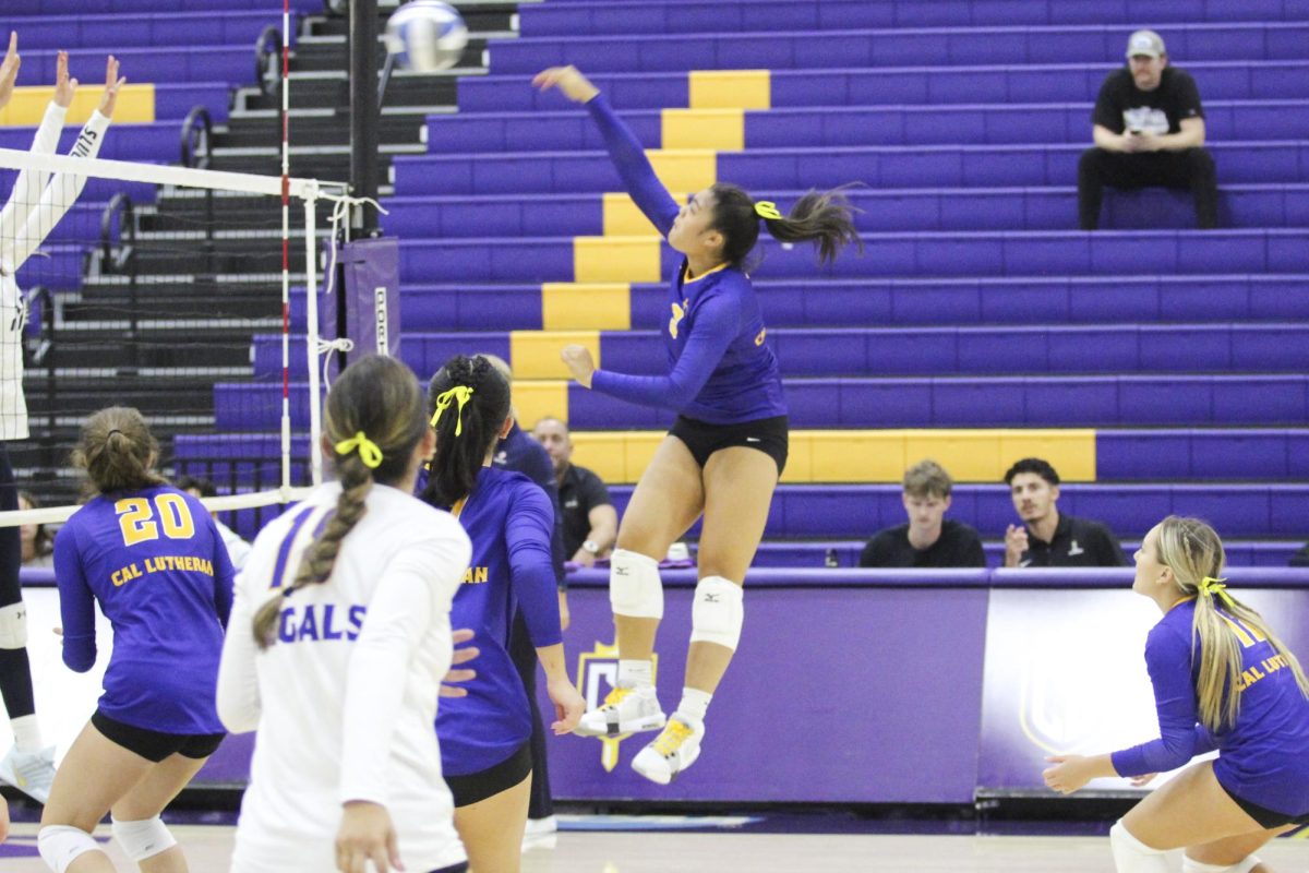 Sophomore right-side hitter Reese Balagot goes in for a kill, which she recorded five of in Saturday night’s match.