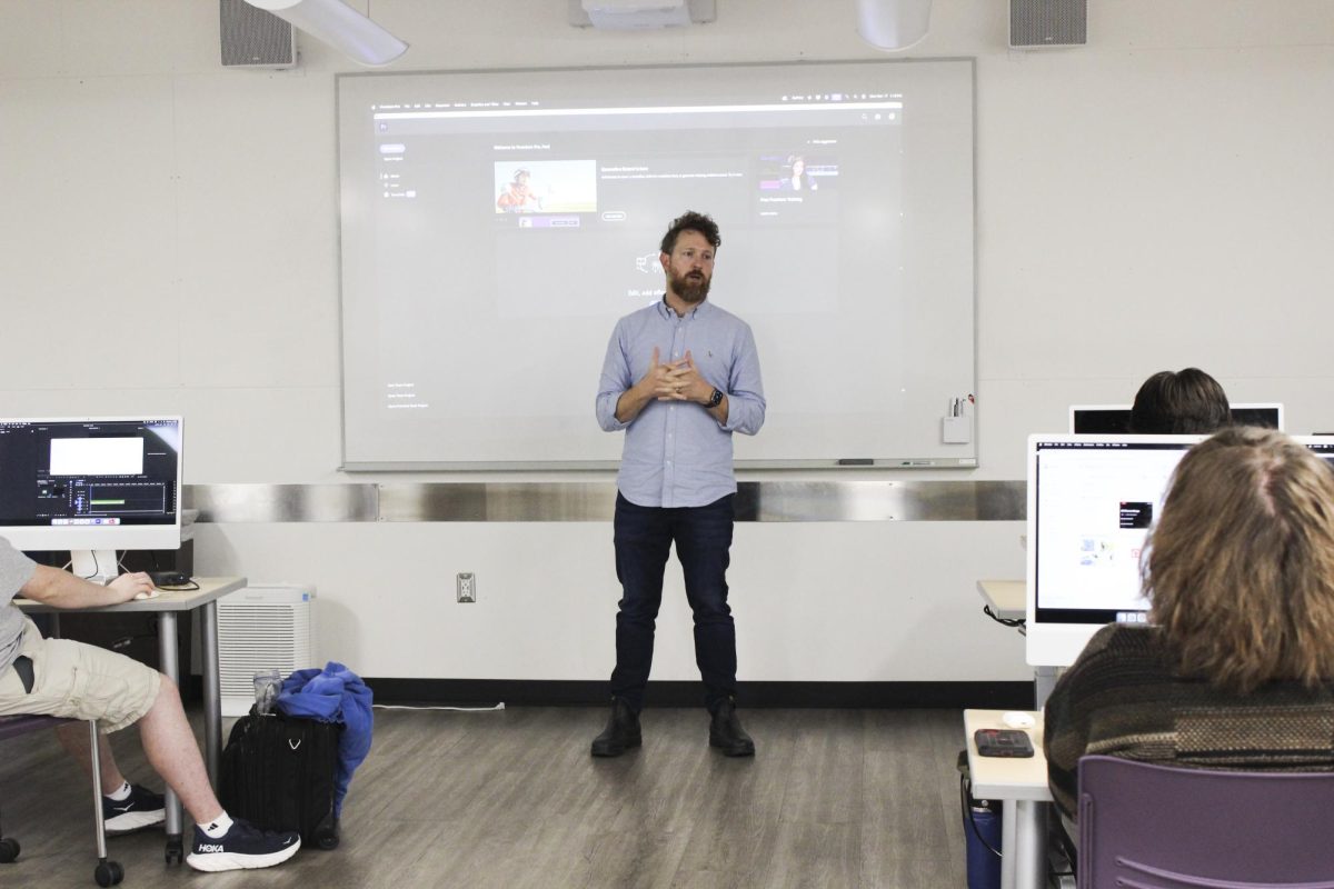 David Martin teaches his Advanced Multimedia I class about Adobe Premiere Pro. 