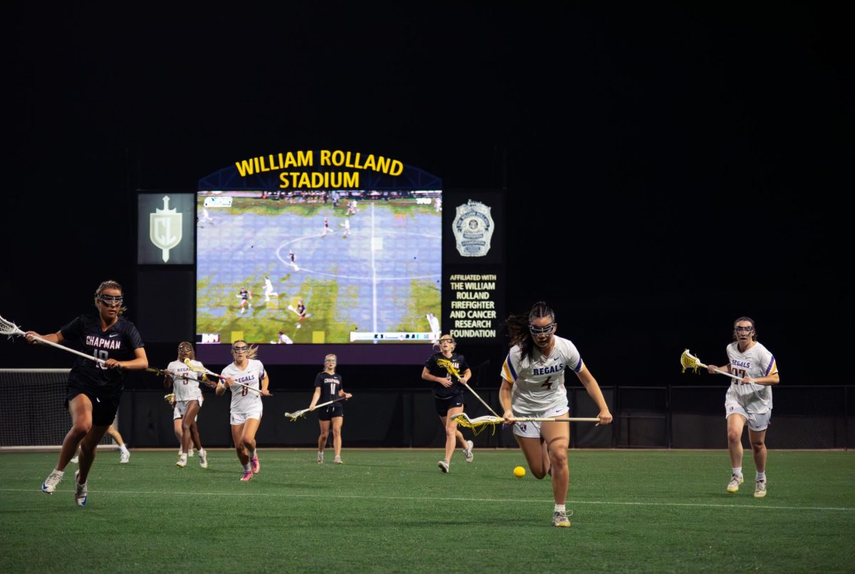 Wearing number four, senior midfielder Sydney Shin netted two of the Regals' eight goals Wednesday night.
