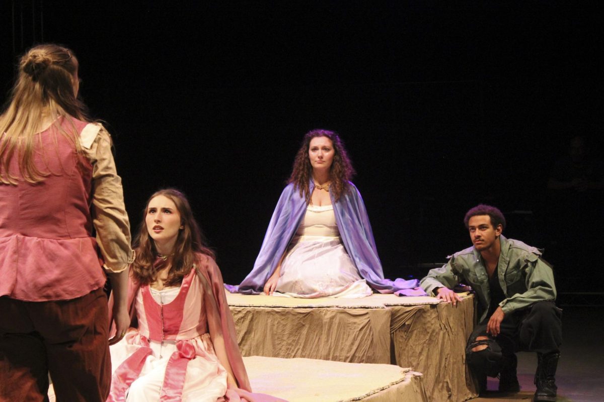 Ruby Strickland (Lysander) tells Kaylena Hoffman (Hermia) he no longer loves her as Fiona Martin (Helena) and Marcus Talbert (Demetrius) look on.